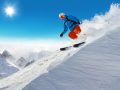 Man skier running downhill on sunny Alps slope